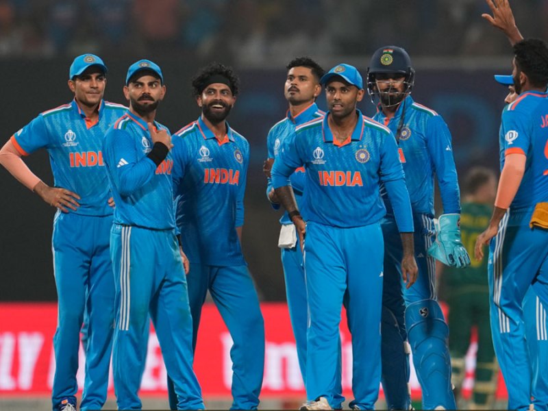 Indian players celebrating after taking a wicket in the World Cup